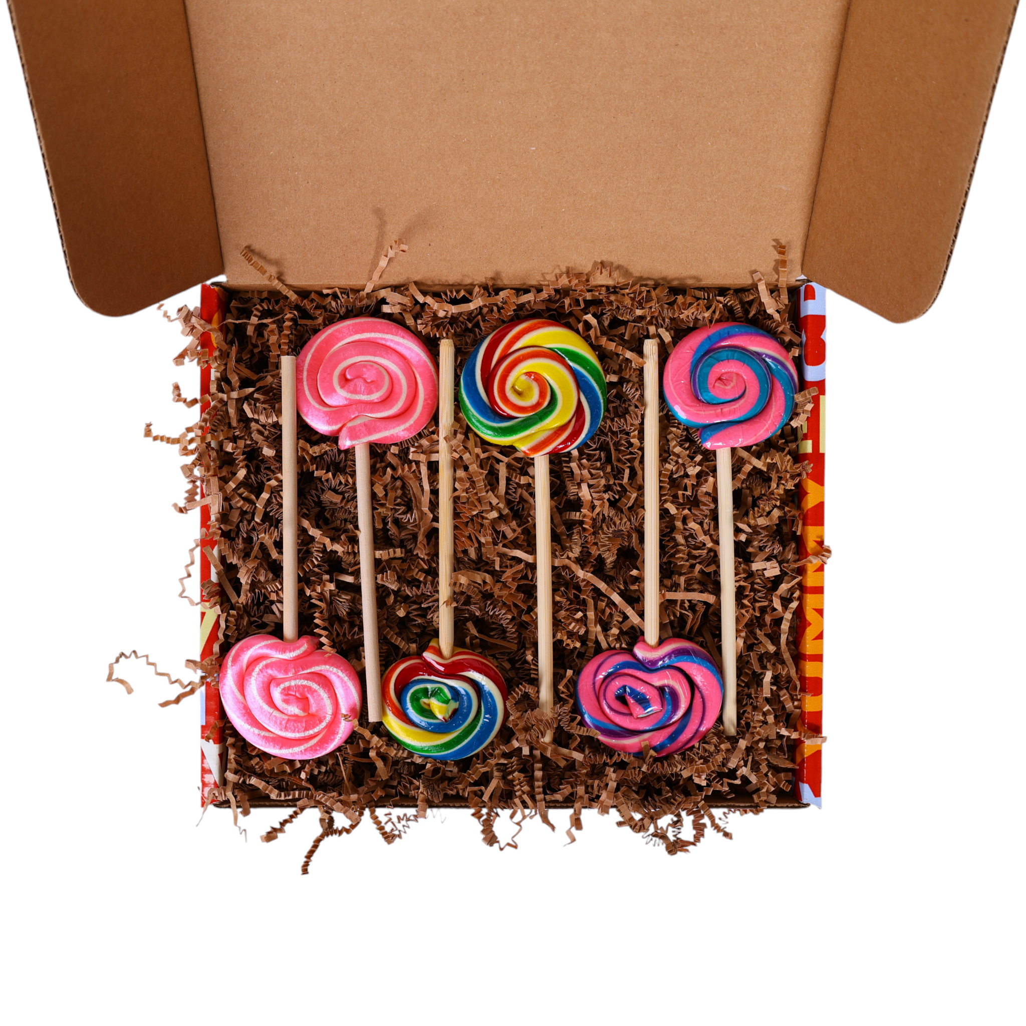 Colorful lollipops in a box with brown tissue paper
