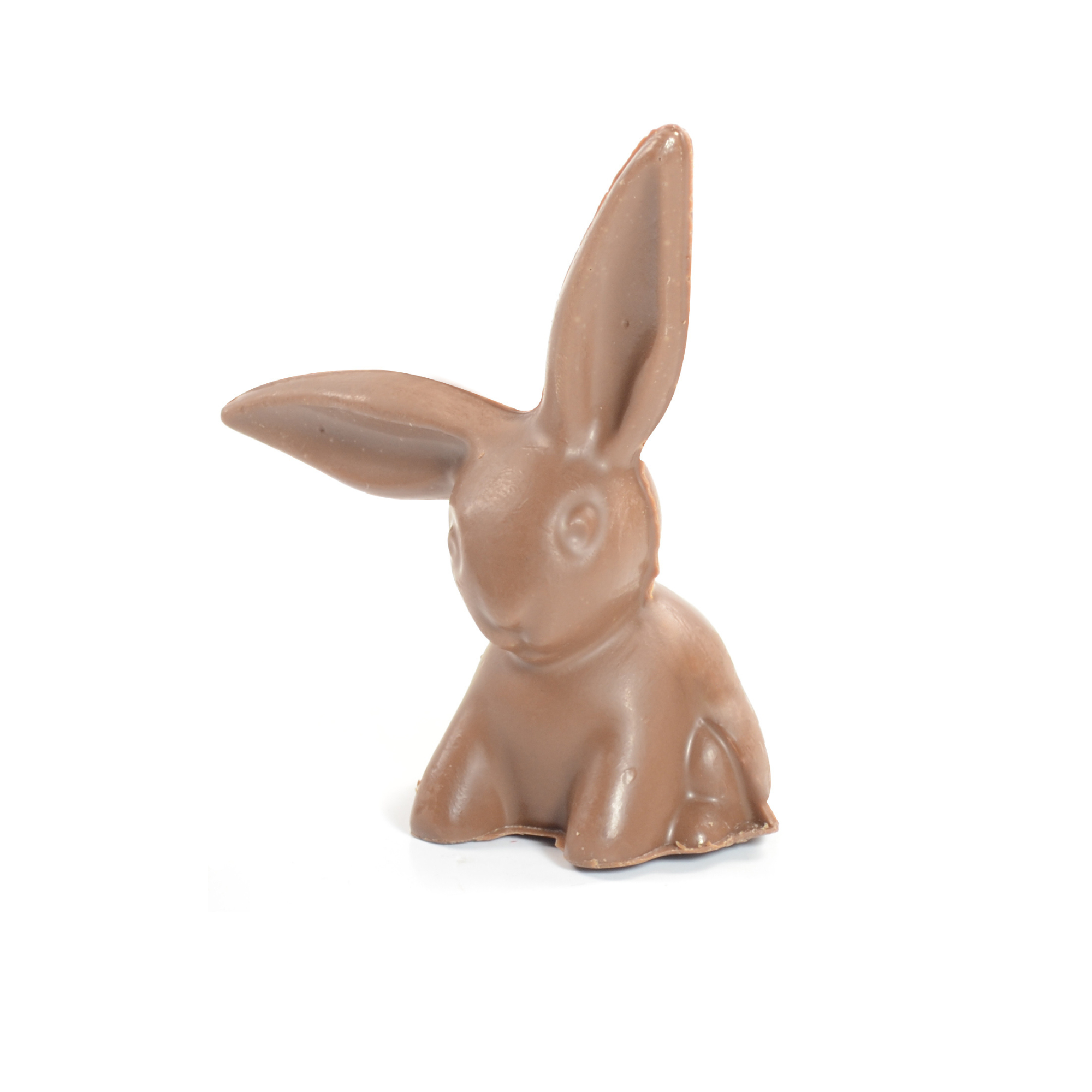 A solid milk chocolate bunny with a green bow on its neck, set against a white background.